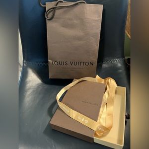 Louis Vuitton box and shopping bag